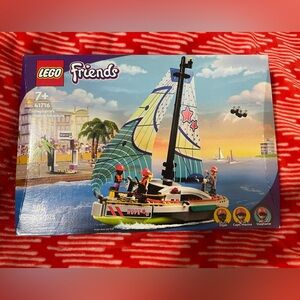 FRIENDS Hope Yacht with Blue and Yellow Sail